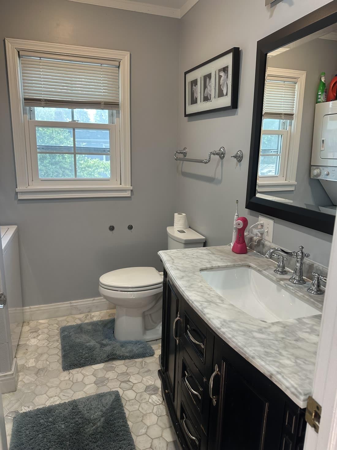 Bathroom with marble vanity