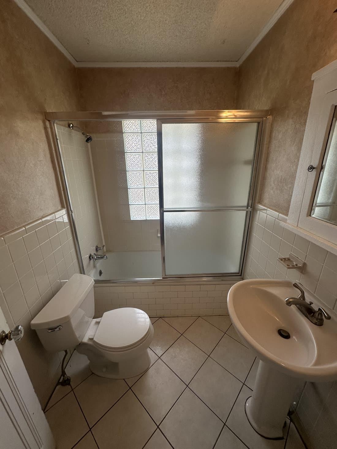 Bathroom with sliding glass shower
